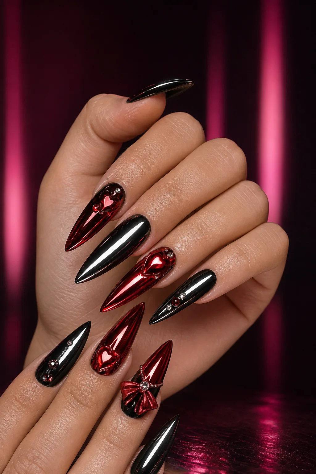 Black chrome and cherry heart nail art
