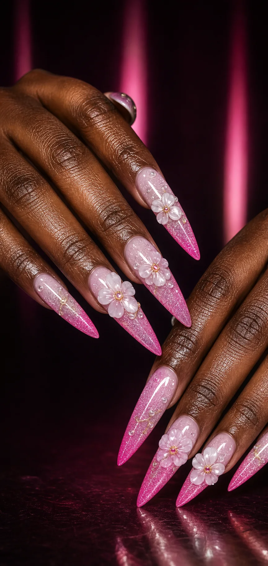 Pink glitter ombre nails with pearl flowers