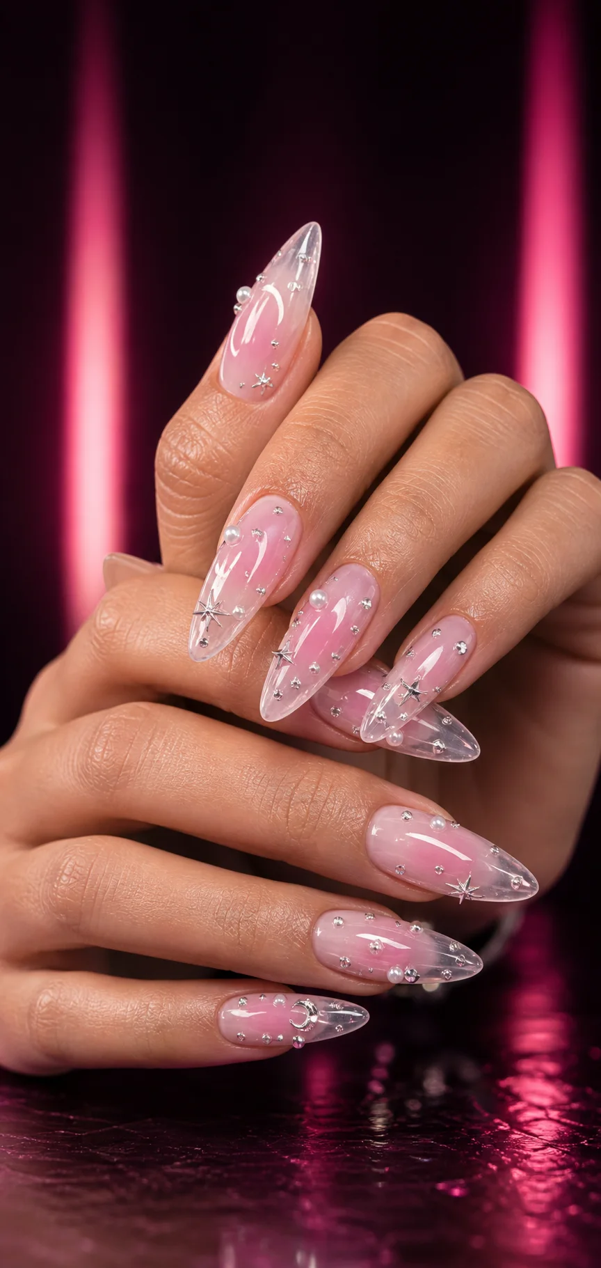 Milky pink aura nails with rhinestone droplets